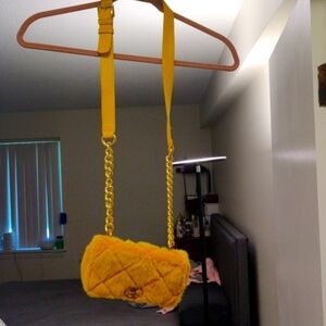 Vintage designer faux fur mini bag with gold chain detail